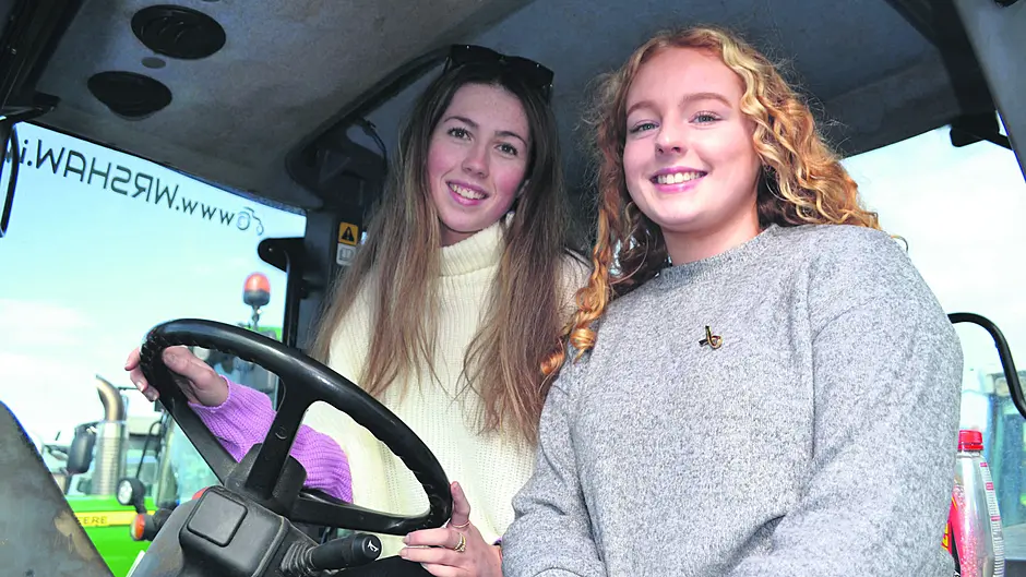 Amy Kearney and Claire Cullinane at the Ricky Barrett Memorial Tractor Run in Skibbereen last Sunday afternoon that was supported by over 400 tractors and was in aid of West Cork Palliative Care and Pieta.                             (Photo: Anne Minihane)