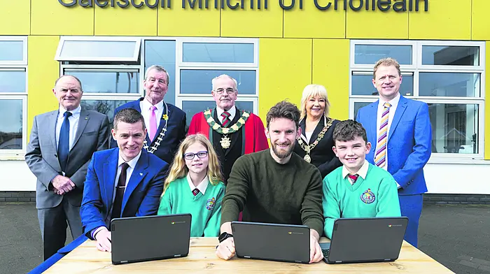 Traolach Ó Donnabháin, board of management chair at Gaelscoil Mhichíl Uí Choileáin, Clonakilty; Stephen Collins, School Computers.ie; Cllr Michael Looney, county deputy mayor; Paddy McCarthy, town mayor; Olympic medal winner Gary O’Donovan; Cllr Deirdre Forde, lord mayor and Pádraig Ó hEachthairn, principal, with pupils Alex Ní Bhriain and Odhran Ó Scolaigh, celebrating winning the Education Mega Draw.(Photo: Michael O’Sullivan)