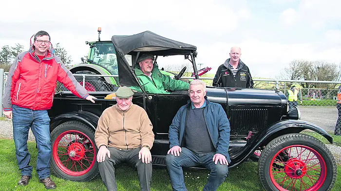 John O’Neill, Ballinadee sitting in his 1926 Model T Ford before the tractor, car, truck and motorcycle run on Easter Monday last in aid of the Courtmacsherry and Kinsale lifeboat stations.  Also included are Bill Chambers, Ballinadee; John Quinn, Ballinspittle; Billy Coomey, Bandon and Rex Draper, Kilbrittain. (Photo: Martin Walsh)