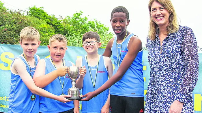 Helen Wycherley, right, representing The Celtic Ross Hotel with Jack Deasy, James Brown, Isaac Limerick, and Tamirat O’Donovan, the U12 crew with their cup and medals during the Glandore Regatta. (Photo: Andrew Harris)