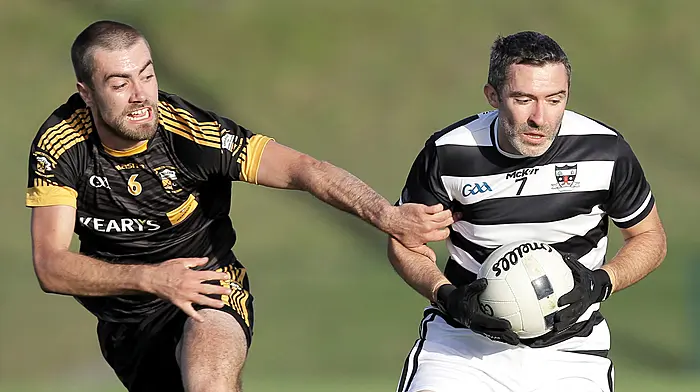 Saints footballers into county final after derby win against Goleen Image