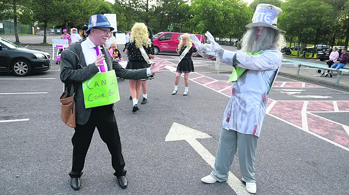 Having fun  at the fancy dress at the Bailiú na Banndan festival in Bandon were Christy O’Neill as Ryan Tubridy  and PJ O’Neill as ‘RTÉ (Picture Denis Boyle)