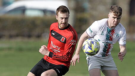 Title-chasing Drinagh's late fightback scrambles point Image