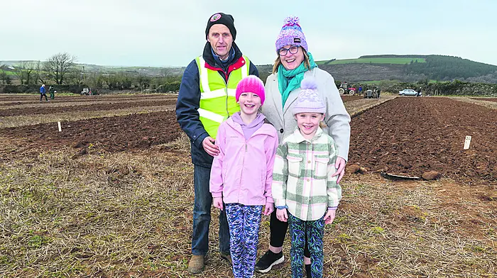 Kevin and Clare O’Sullivan from Kilmalooda with daughters Grace and Olivia at the Clogagh ploughing.
