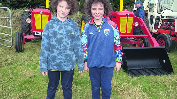 At a recent tractor run in Ahiohill  in aid of Feed West Cork Food Banks in Drimoleague and Bandon were twins Jack and Declan Corcoran from Crookstown.	                      (Photo: Denis Boyle)