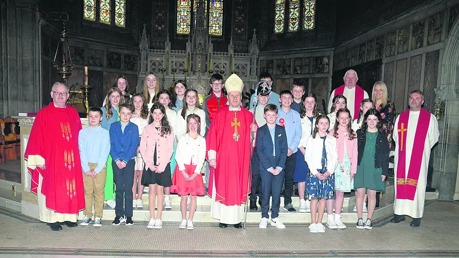 Bishop of Cork and Ross Dr Fintan Gavin with students of Laragh NS on their confirmation day in Bandon church. 			               (Photo: Denis Boyle)