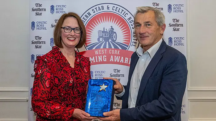 Pat Moriarty collects the September award presented by Margaret O'Rourke of Scally's Supervalu.