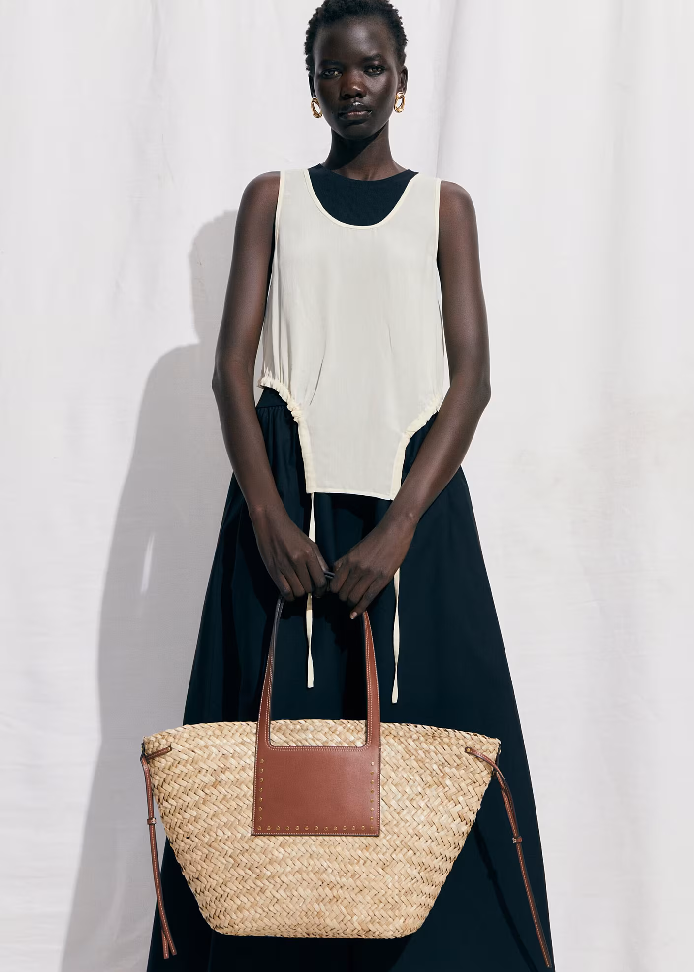 Double strap basket bag, € 59.99, at Mango