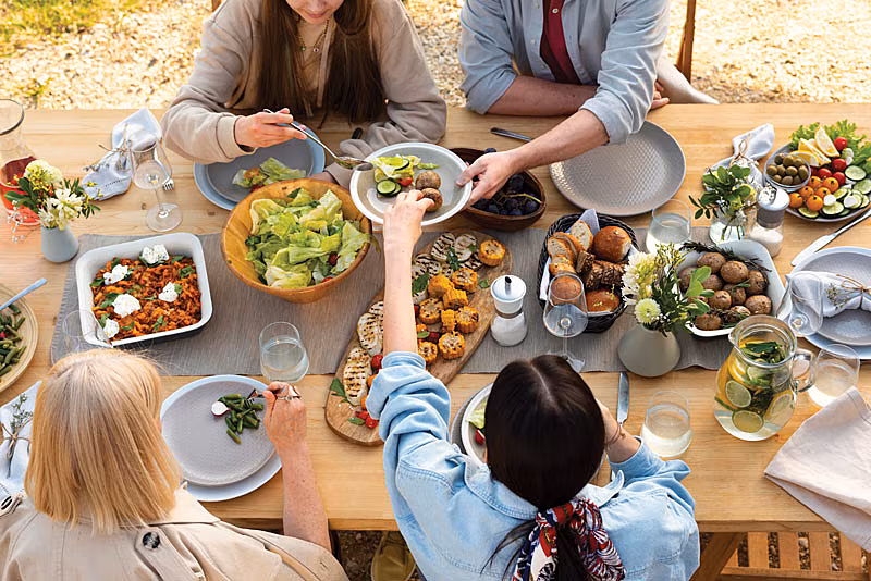 close-up-people-table-with-delicious-food