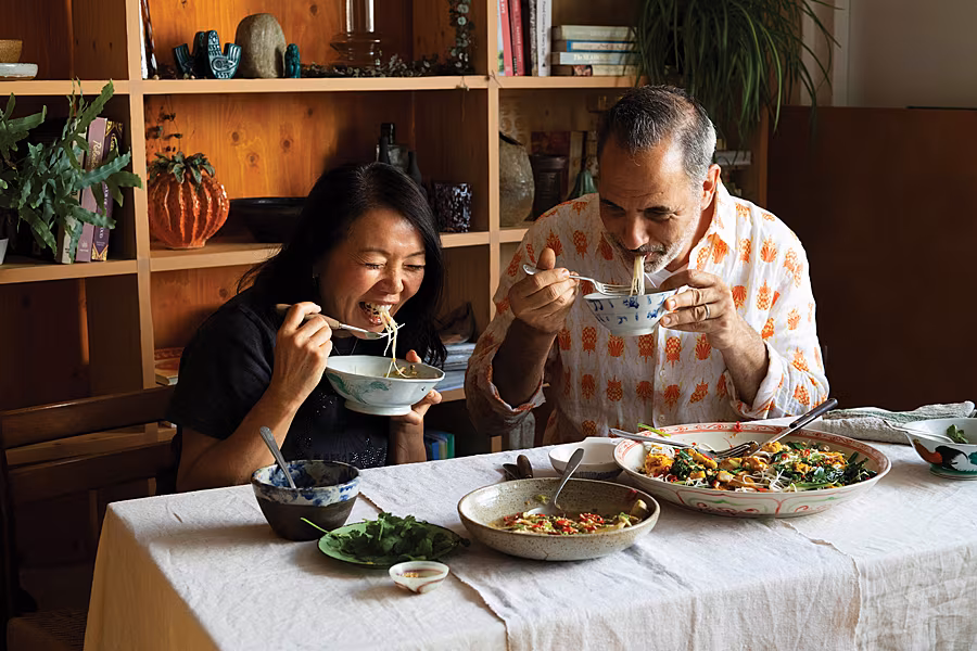 Yotam-&-Helen-eating-Steamed_Aubergine_Turmeric_Fish_XXVII