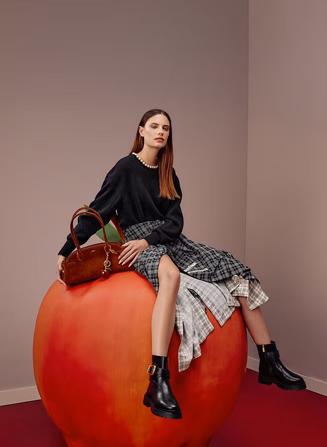 Essential-Antwerp-Knitwear-€195-Skirt-€285-,-Coach-bag-(Retro-Glam-trend)