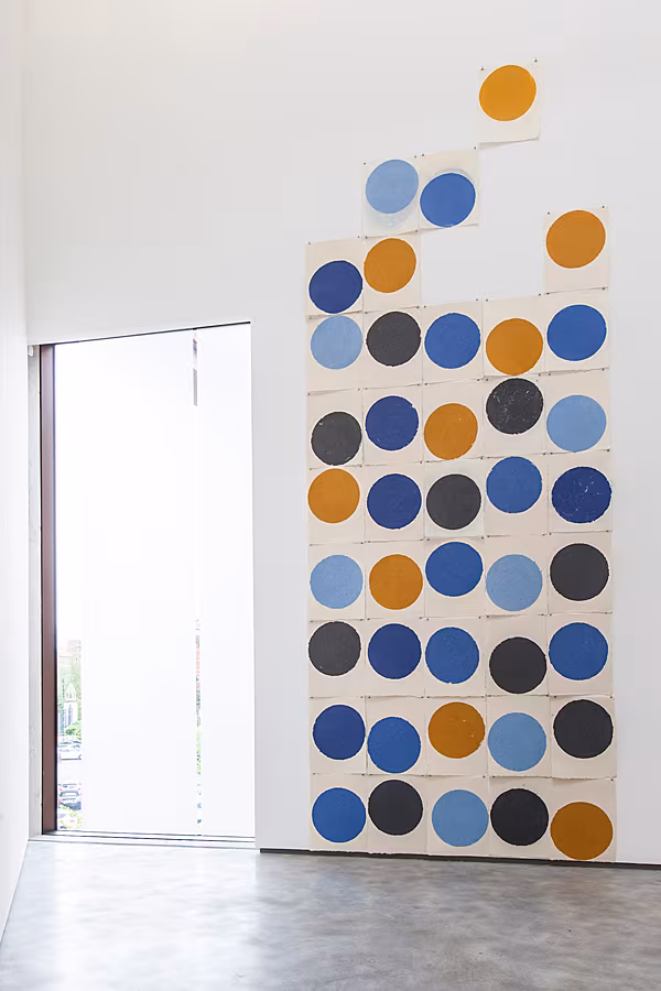 Richard-Gorman,-All-Wall-(balls,-coloured),-2013,-Echizen-kozo-washi-paper,-each-sheet-49-x-63-cm;-,-installation-view-at-The-MAC,-Belfast,-9-May-–-July-2014.-Image-courtesy-the-artist,-Kerlin-Gallery-and-The-MAC