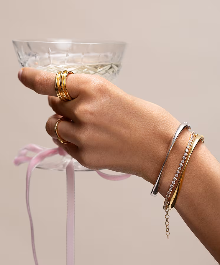 12-Days-of-Christmas-Giveaway-Image.-Gold-Chunky-Ridged-Ring-€310.-Silver-Wave-Bangle-€285.-Gold-Classic-Tennis-Bracelet-€125.-Gold-Wave-Bangle-€325