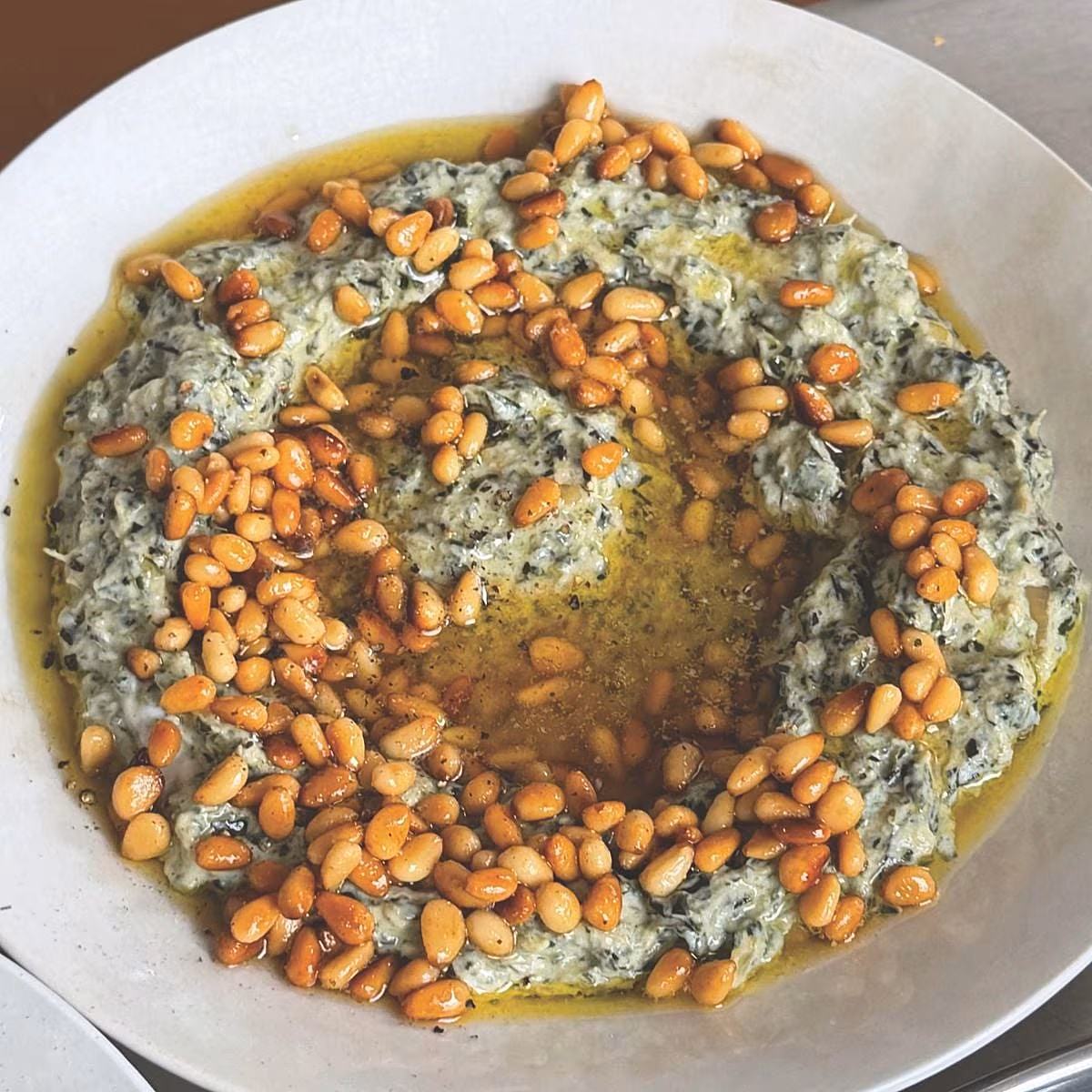 Spinach & Caramelised Onion Borani with Toasted Pine Nuts