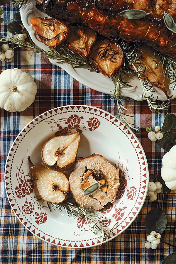 N---p164-Dried-Fruit-Stuffed-Pork-Loins-with-Pears.-Photo-credit-©-Christophe-Roué
