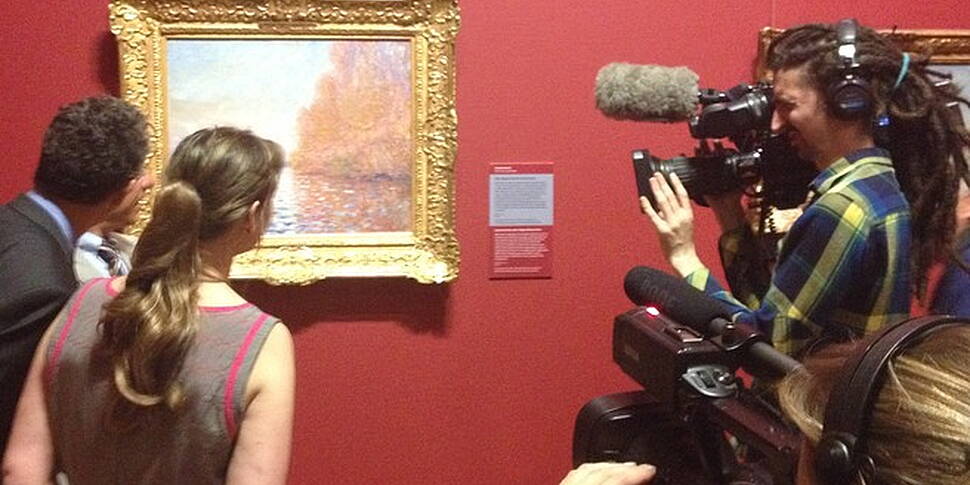 Damaged Monet painting back on...