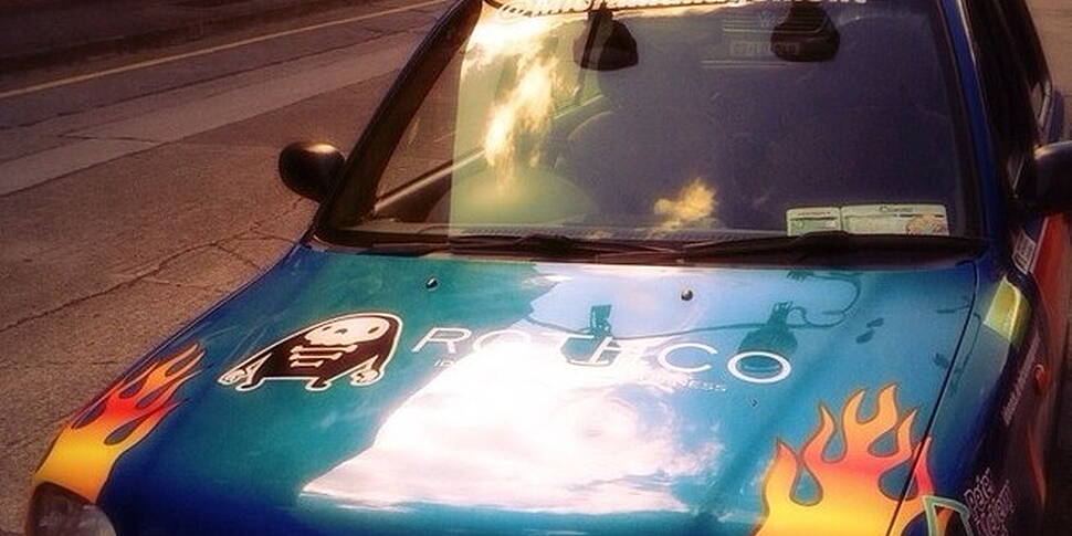 3 men in a little micra