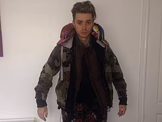 Lad Wears 12 Layers Of Clothes...