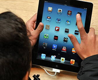 iPads teaching children from 2...