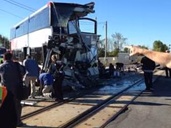 6 dead in Canadian bus and tra...