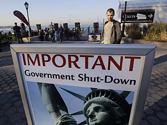 KERRY SAYS SHUTDOWN COULD WEAK...