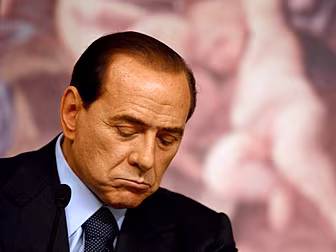 BERLUSCONI BANNED FROM OFFICE...