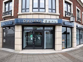 Danske customers urged to with...