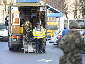 BOMB SQUAD INVESTIGATES DEVICE...