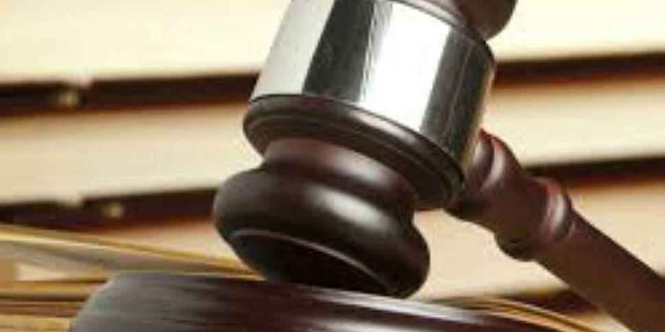 Two men charged over Shane Mur...