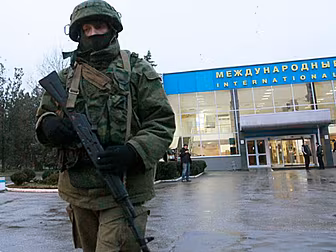 Russia accused of occupying ai...