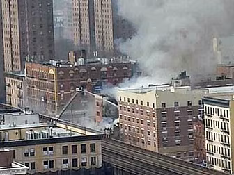 Building collapses in New York...