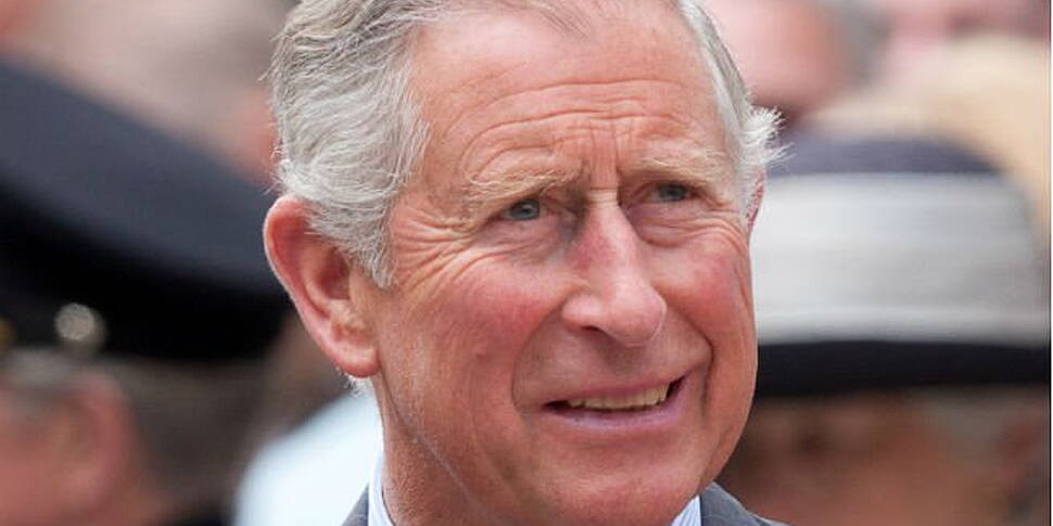Adams & Prince Charles shake h...
