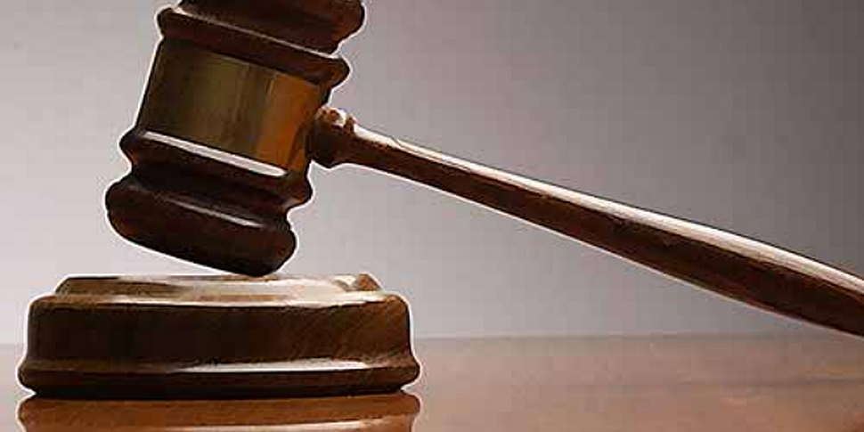 Woman charged with murder of T...
