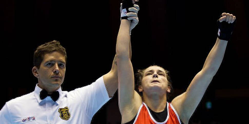 Katie into final after tough b...