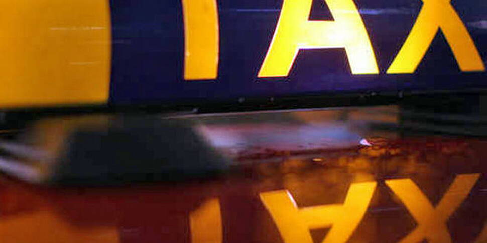Two men on the run after taxi...
