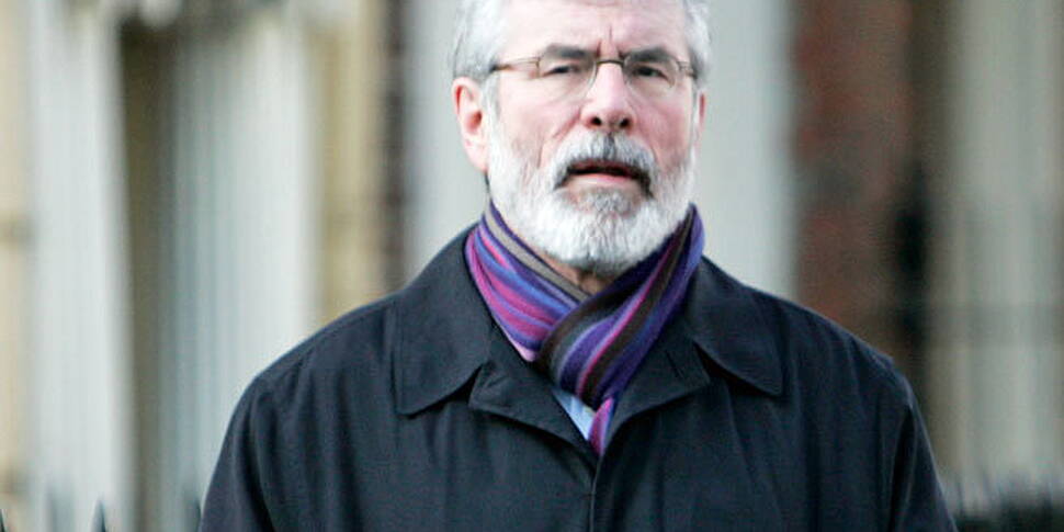 Adams labels bomb threateners...