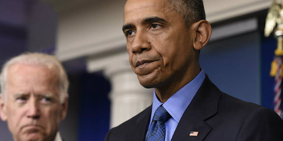 Obama heckled in White House