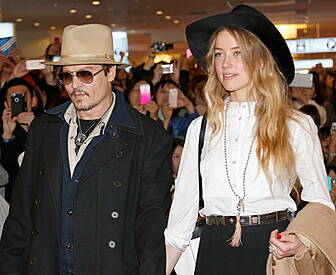 Amber Heard to fight dog smugg...