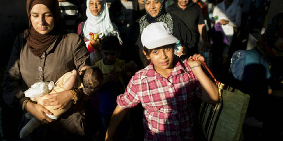 8,000 refugees have arrived in...