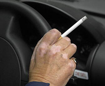 It is now illegal to smoke in...