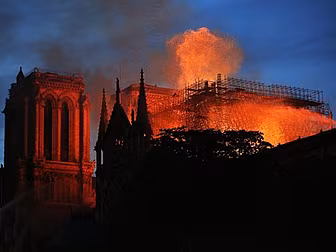 Macron Says France Will Rebuil...