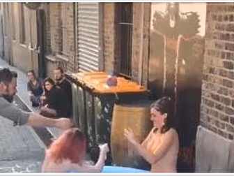 Two Girls Set Up A Paddling Po...
