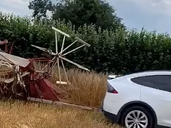 A Tesla Turns Into A Tractor T...