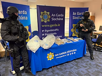 2 Men Arrested After Guns, Dru...