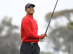 Tiger Woods and caddie sued by...