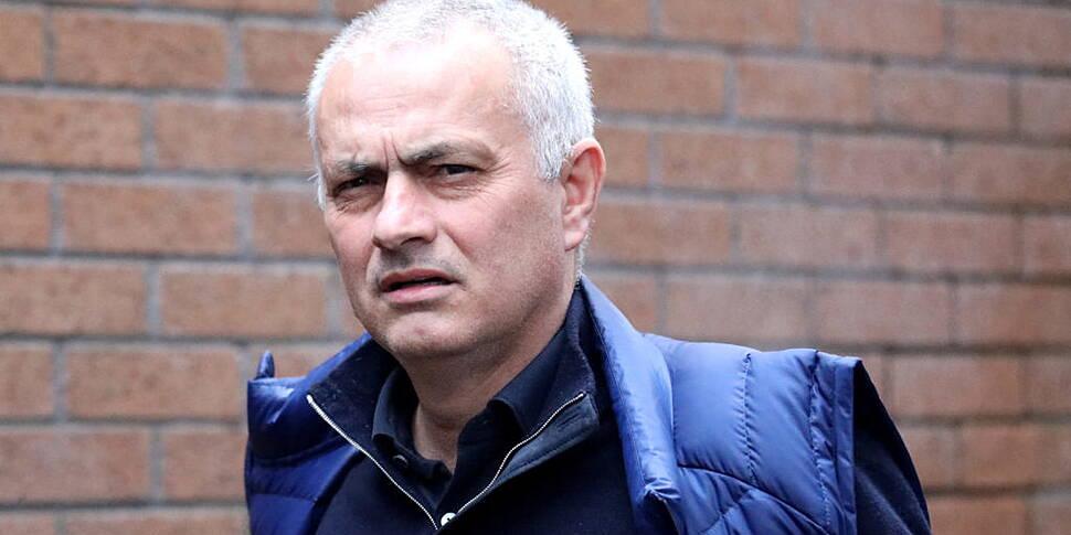 Mourinho holds his hands up ov...