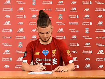 Harvey Elliott signs first pro...