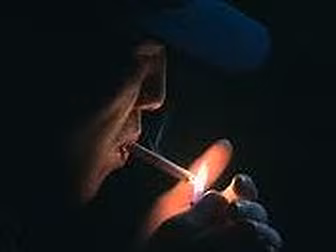 Should Smoking Be Banned While...