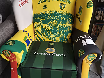 Football Lover Takes Armchair...